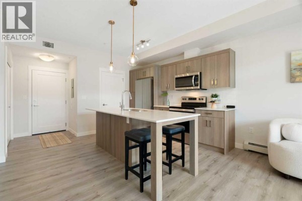 Kitchen - 209, 25 Walgrove Walk Se, Calgary, AB T2X5E2 Photo 4