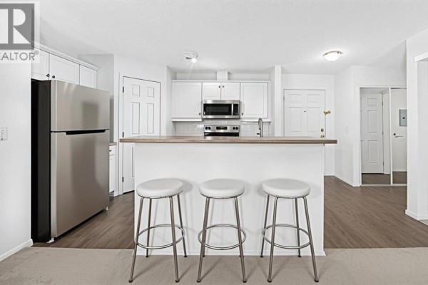 Primary Bedroom - 209, 260 Shawville Way Se, Calgary, AB T2Y3Z7 Photo 4