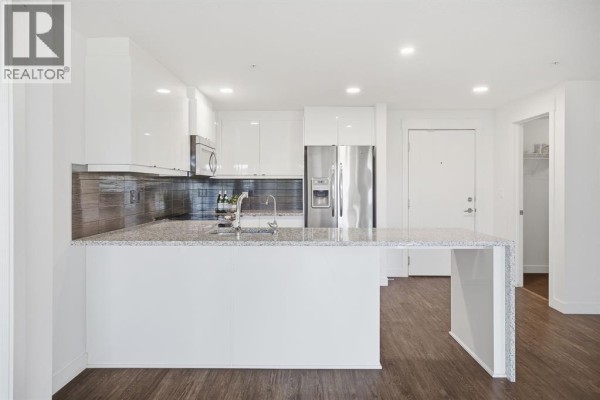 Bedroom - 209, 45 Aspenmont Heights Sw, Calgary, AB T3H0E6 Photo 5