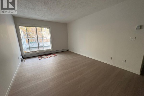 Primary Bedroom - 209, 732 57 Avenue Sw, Calgary, AB T2V0H4 Photo 4