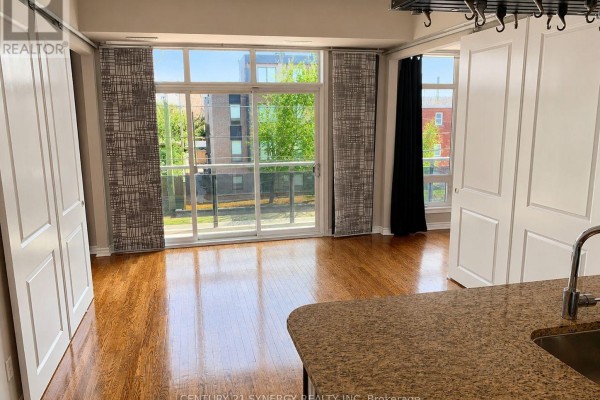 Living room - 209 - 682 Churchill Avenue N, Ottawa, ON K1Z5G5 Photo 3