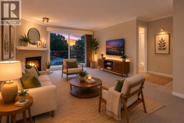 Living room with beige carpet, corner fireplace, and sliding doors to balcony. - 209 10220 Ryan Road, Richmond