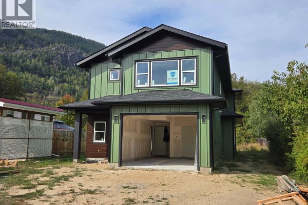 Laundry room - 209 12th Avenue Frontage Road, Genelle, BC V0G1G0 Photo 3