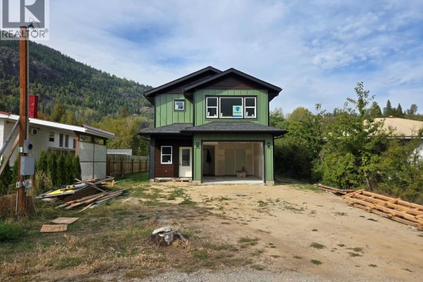 Family room - 209 12th Avenue Frontage Road, Genelle, BC V0G1G0 Photo 4
