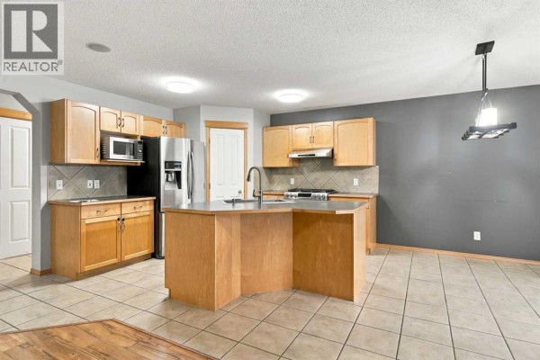 Kitchen - 209 Tuscany Ravine Road Nw, Calgary, AB T3L2W9 Photo 4