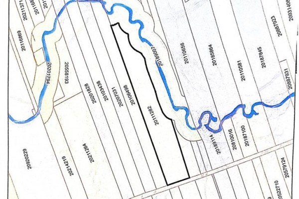Survey map showing a land parcel bordered by a winding blue river and numbered lots. - 21.42 Acres Rte 355, Rang Saint Georges