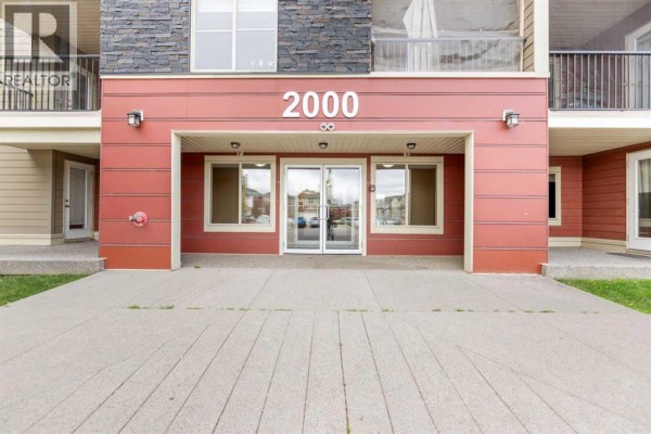 Kitchen - 210, 15 Saddlestone Way Ne, Calgary, AB T3J0S3 Photo 2