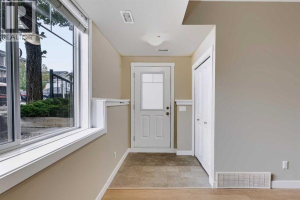 Living room/Dining room - 210, 300 Marina Drive, Chestermere, AB T1X0P6 Photo 5