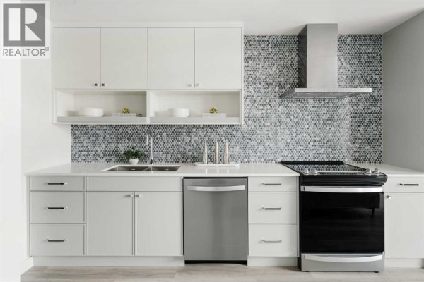 Primary Bedroom - 210, 60 Water Cove Se, Calgary, AB T3M3T9 Photo 5