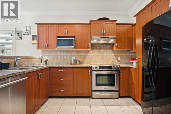210 3000 Riverbend Drive, Coquitlam, BC V3C6R1 Photo 4