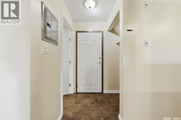 Living room - 210 515 28th Street E, Prince Albert, SK S6V1X8 Photo 3