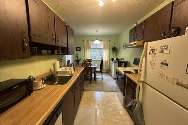210 7426 138 Street, Surrey, BC V3W6G4 Photo 2