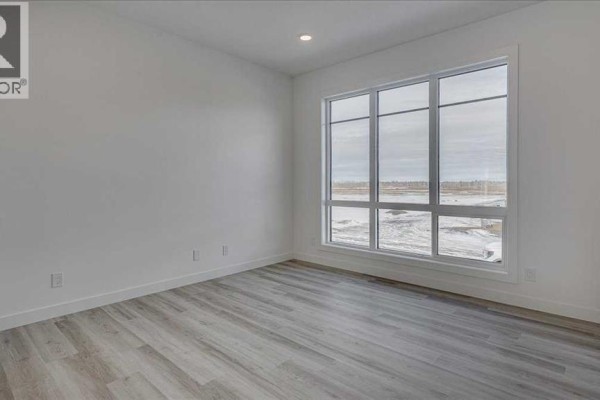 Living room - 210 Athens Road, Blackfalds, AB T4M0Y6 Photo 4