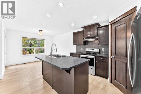 Kitchen - 210 Brightonstone Green Se, Calgary, AB T2C0C7 Photo 5