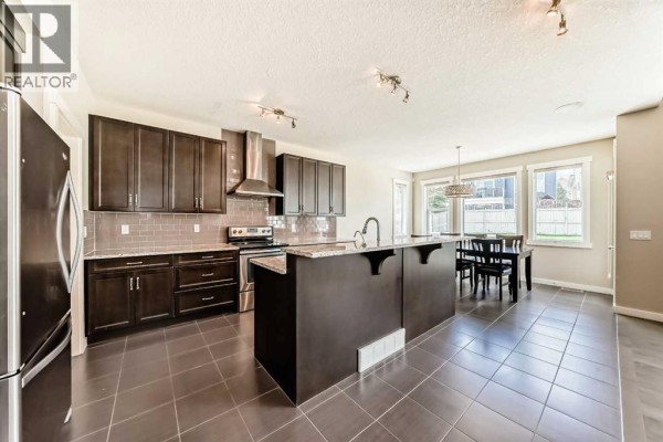 Living room - 210 Stonemere Green, Chestermere, AB T1X0S2 Photo 5