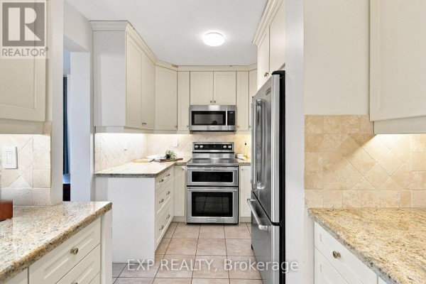 Kitchen - 2101 - 1515 Lakeshore Road E, Mississauga, ON L5E3E2 Photo 3