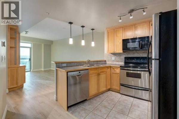 Living room - 2104, 836 15 Avenue Sw, Calgary, AB T2R1S2 Photo 3