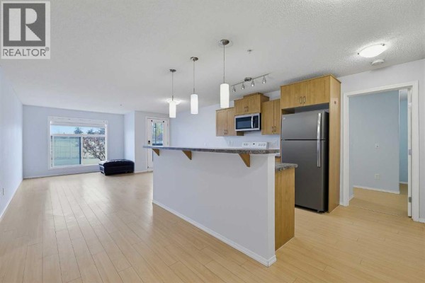 Kitchen - 2105, 700 Willowbrook Road Nw, Airdrie, AB T2R0E5 Photo 2