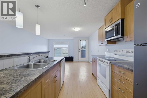Bedroom - 2105, 700 Willowbrook Road Nw, Airdrie, AB T2R0E5 Photo 4