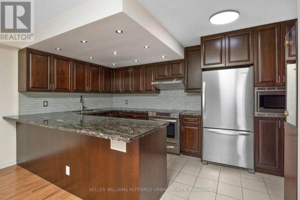 Kitchen - 2105 - 205 Wynford Drive, Toronto, ON M3C3P4 Photo 3