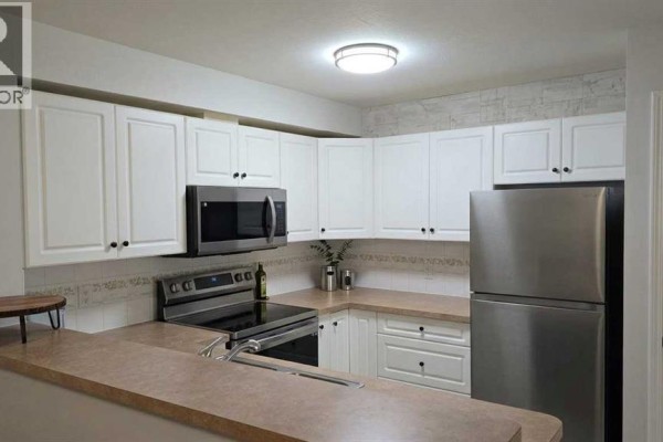 Living room - 2106, 11 Chaparral Ridge Drive Se, Calgary, AB T2X3P7 Photo 5