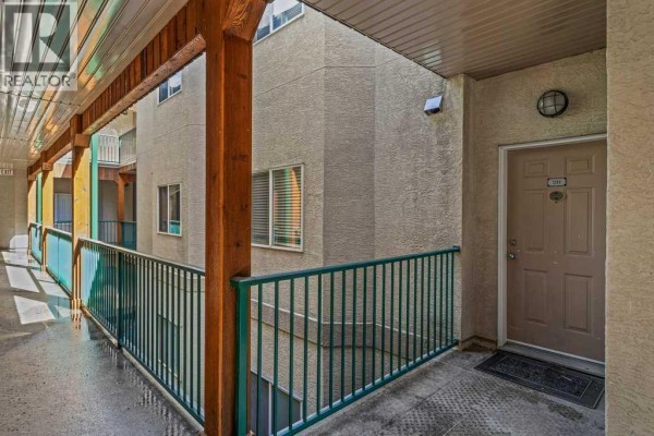 Living room - 211, 176 Kananaskis Way, Canmore, AB T1W3E4 Photo 2