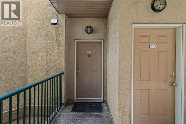 Kitchen - 211, 176 Kananaskis Way, Canmore, AB T1W3E4 Photo 3