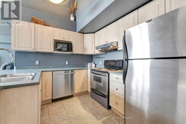 Primary Bedroom - 212 - 111 Grey Street, Brantford, ON N3S4V8 Photo 4