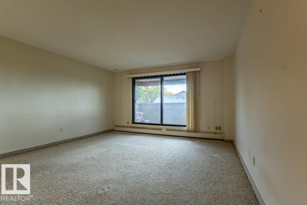Bedroom 2 - #212 5316 118 Av Nw Nw, Edmonton, AB T5W1C4 Photo 5