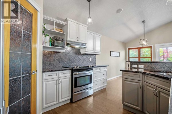 Laundry room - 212 Westland Street, Okotoks, AB T1S2L3 Photo 4