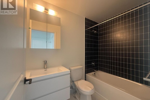 Living area with large windows offering city views and natural light - 2120 - 56 Andre De Grasse Street, Markham