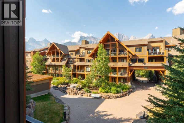 Living room - 213, 173 Kananaskis Way, Canmore, AB T1W0A2 Photo 2