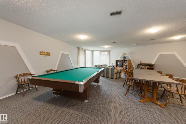 Primary Bedroom - #213 5125 Riverbend Rd Nw, Edmonton, AB T6H5K5 Photo 4
