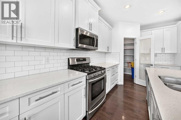 Laundry room - 213 Heritage Boulevard, Cochrane, AB T4C0S6 Photo 5