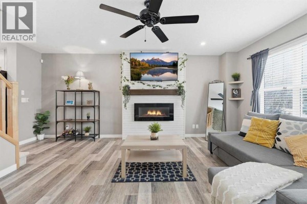 Living room - 213 Silverado Drive Sw, Calgary, AB T2X0C7 Photo 4