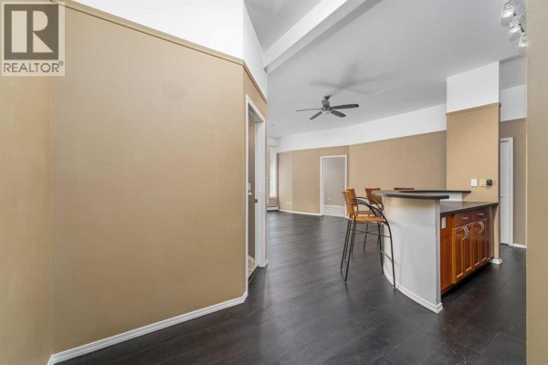 Living room - 214, 1410 2 Street Sw, Calgary, AB T2R1R1 Photo 4