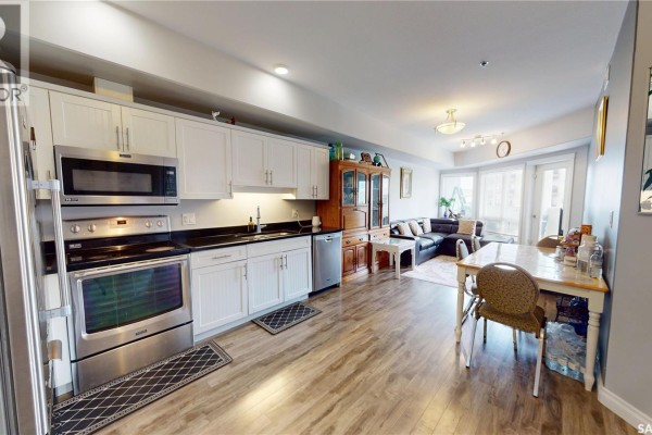 Living room - 214 412 Willowgrove Square, Saskatoon, SK S7W0T2 Photo 2