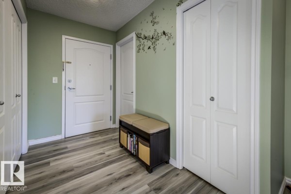Primary Bedroom - #214 905 Blacklock Wy Sw, Edmonton, AB T6W1M7 Photo 4