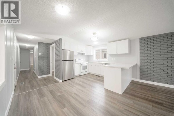 Bedroom - 215, 6220 17 Avenue, Calgary, AB T2A0W6 Photo 3
