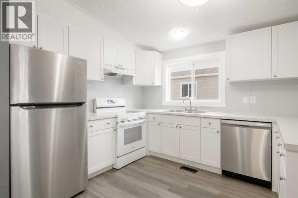 Bedroom - 215, 6220 17 Avenue, Calgary, AB T2A0W6 Photo 4