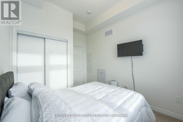Primary Bedroom - 215 - 30 Halliford Place, Brampton, ON L6P4R1 Photo 4