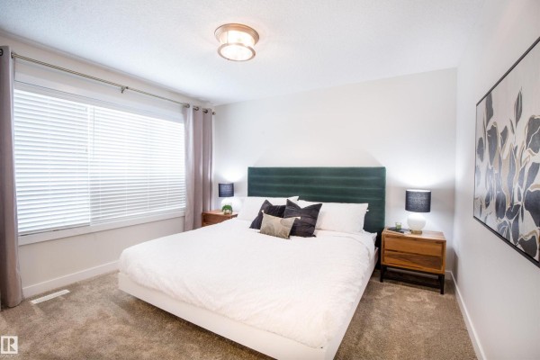 Primary Bedroom - 2152 1 Av Sw, Edmonton, AB T6X3E2 Photo 4