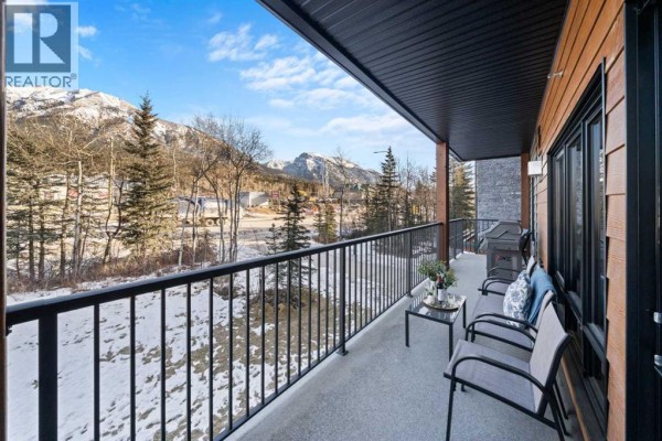 Bedroom - 217, 1730 Bow Valley Trail, Canmore, AB T1W2X3 Photo 4