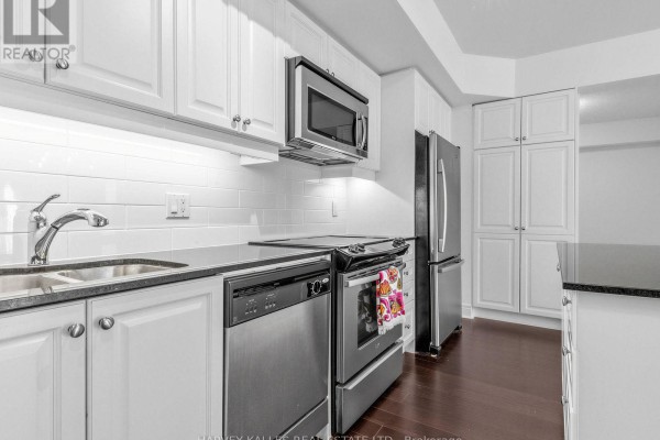 Bedroom 2 - 217 - 701 Sheppard Avenue, Toronto, ON M3H0B2 Photo 5