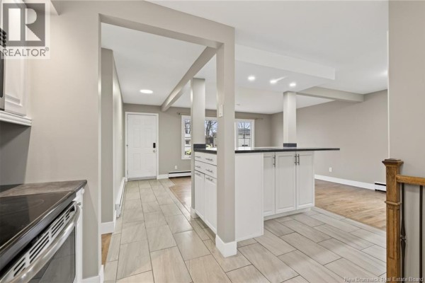 A view from the kitchen area into the living room and hallway. - 217 Canterbury Avenue, Riverview