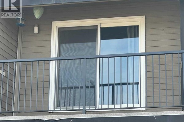Living room - 217a, 5611 10 Avenue, Edson, AB T7E1R4 Photo 2