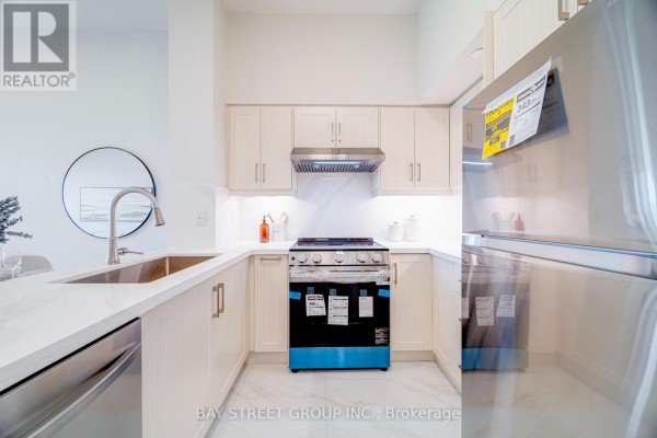 Den - 218 - 1038 Mcnicoll Avenue, Toronto, ON M1W0A4 Photo 5