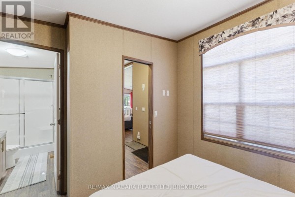 Bedroom 2 - 218 - 1501 Line 8 Road, Niagara On The Lake, ON L0S1L0 Photo 4