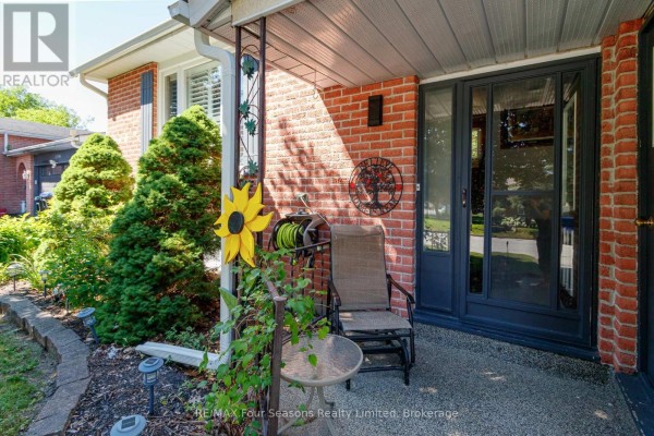 Dining area with wooden table, chairs, and open layout to kitchen. - 218 Datas Drive, Clearview