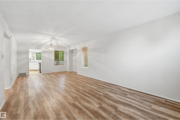 Family room - 219 Buchanan Cl Nw, Edmonton, AB T6R2B7 Photo 4